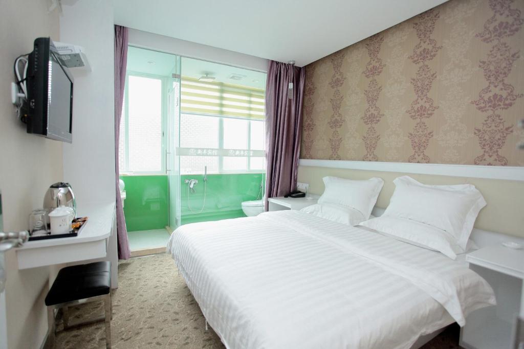 Xinghe Xinfeng Hotel Cantão Quarto foto