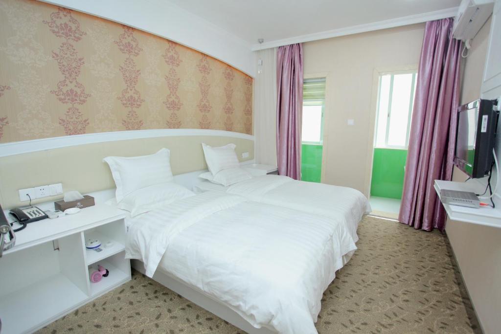 Xinghe Xinfeng Hotel Cantão Quarto foto