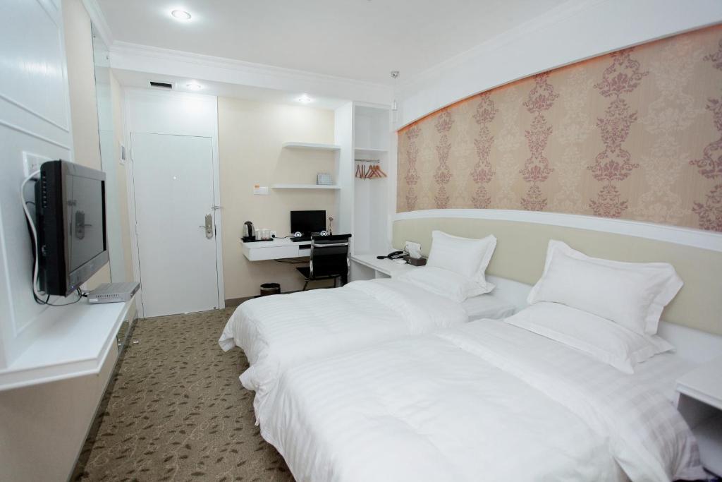Xinghe Xinfeng Hotel Cantão Quarto foto