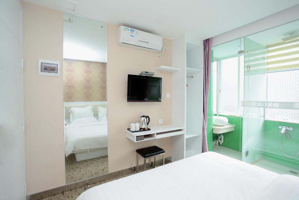 Xinghe Xinfeng Hotel Cantão Quarto foto